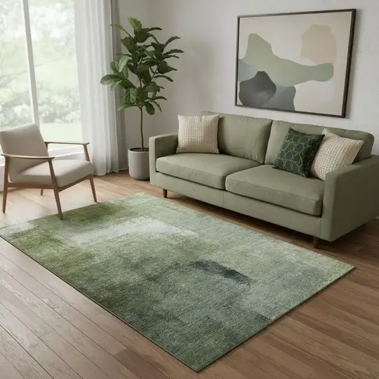 Green And Ivory Abstract Washable Area Rug With UV Protection Photo 1