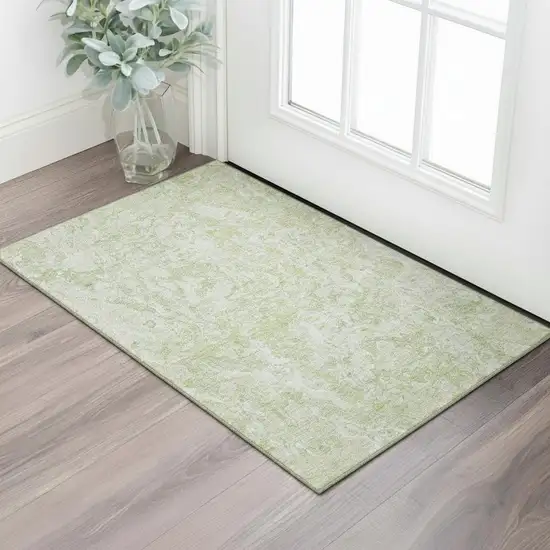 Green And Ivory Abstract Washable Area Rug With UV Protection Photo 1
