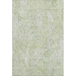 Photo of Green And Ivory Abstract Washable Area Rug With UV Protection