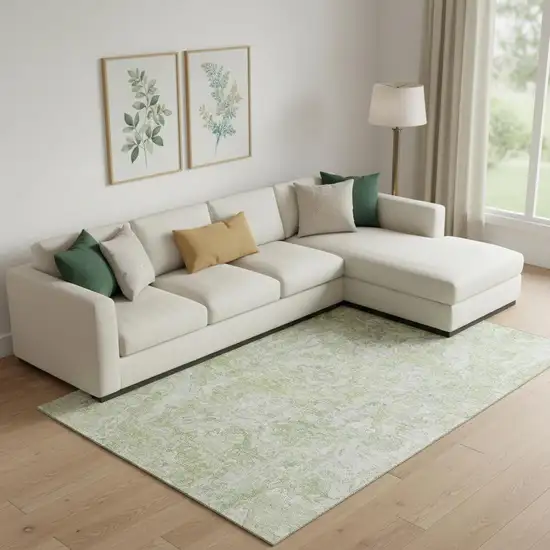 Green And Ivory Abstract Washable Area Rug With UV Protection Photo 1