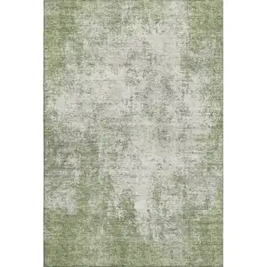 Photo of Green And Ivory Abstract Washable Area Rug With UV Protection