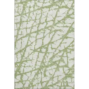 Photo of Green And Ivory Abstract Washable Area Rug With UV Protection