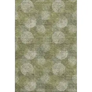 Photo of Green And Ivory Abstract Washable Area Rug With UV Protection