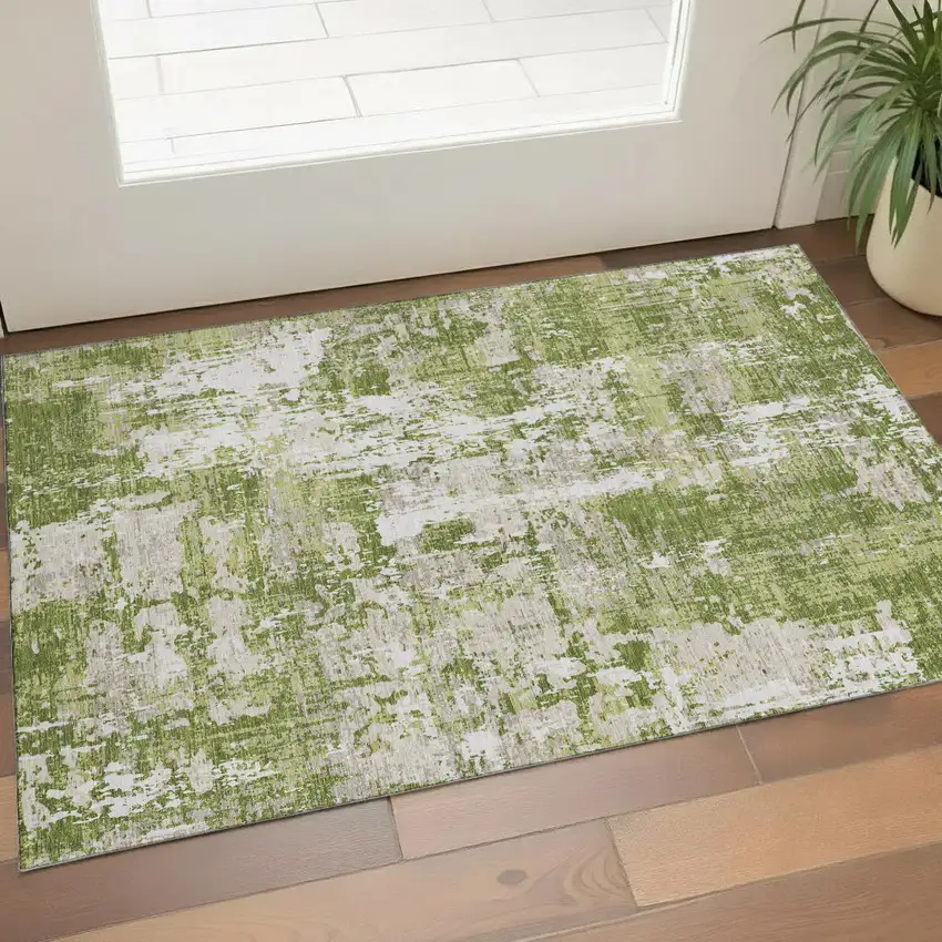 Green And Ivory Abstract Washable Area Rug With UV Protection Photo 1
