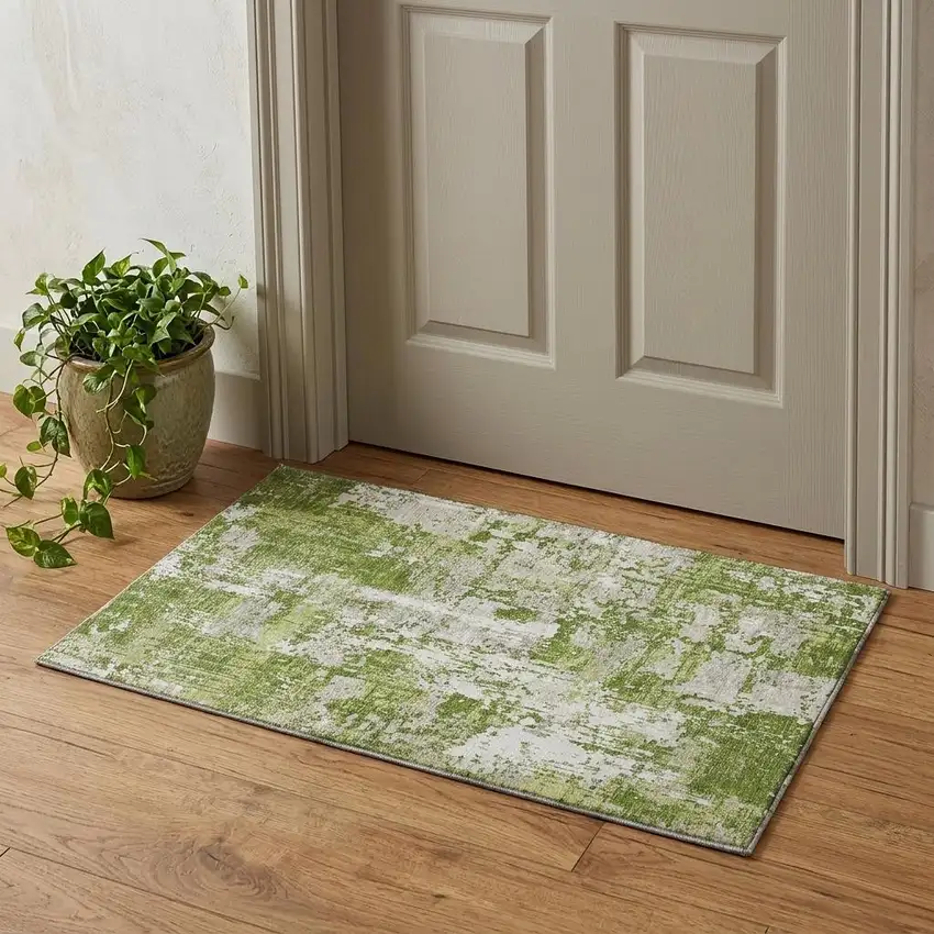 Green And Ivory Abstract Washable Area Rug With UV Protection Photo 1