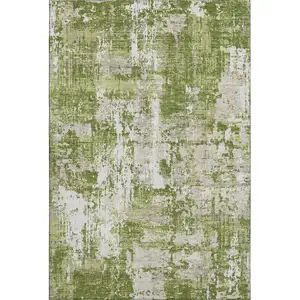 Photo of Green And Ivory Abstract Washable Area Rug With UV Protection