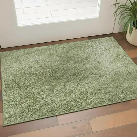 Green And Ivory Abstract Washable Area Rug With UV Protection Photo 2