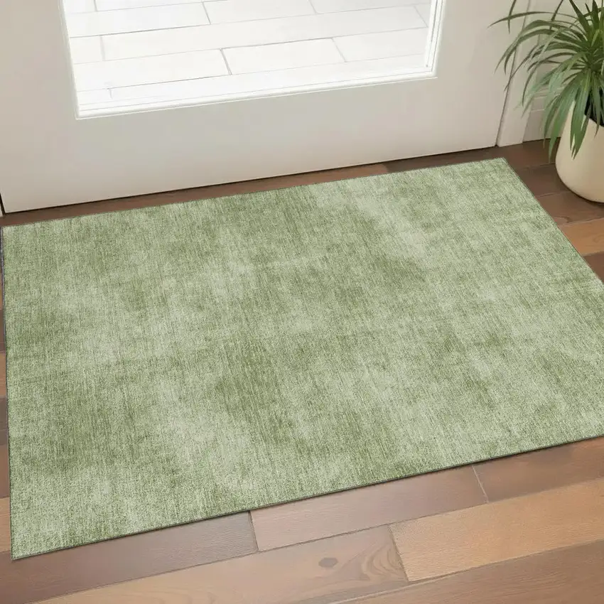 Green And Ivory Abstract Washable Area Rug With UV Protection Photo 1