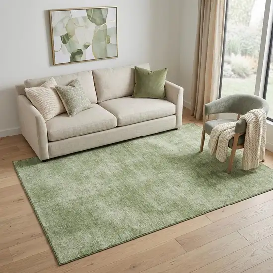 Green And Ivory Abstract Washable Area Rug With UV Protection Photo 1