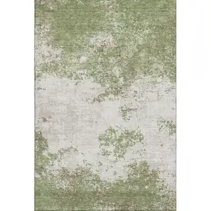 Photo of Green And Ivory Abstract Washable Area Rug With UV Protection
