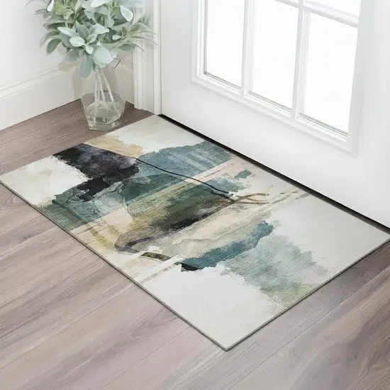 Green And Ivory Abstract Washable Area Rug With UV Protection Photo 1