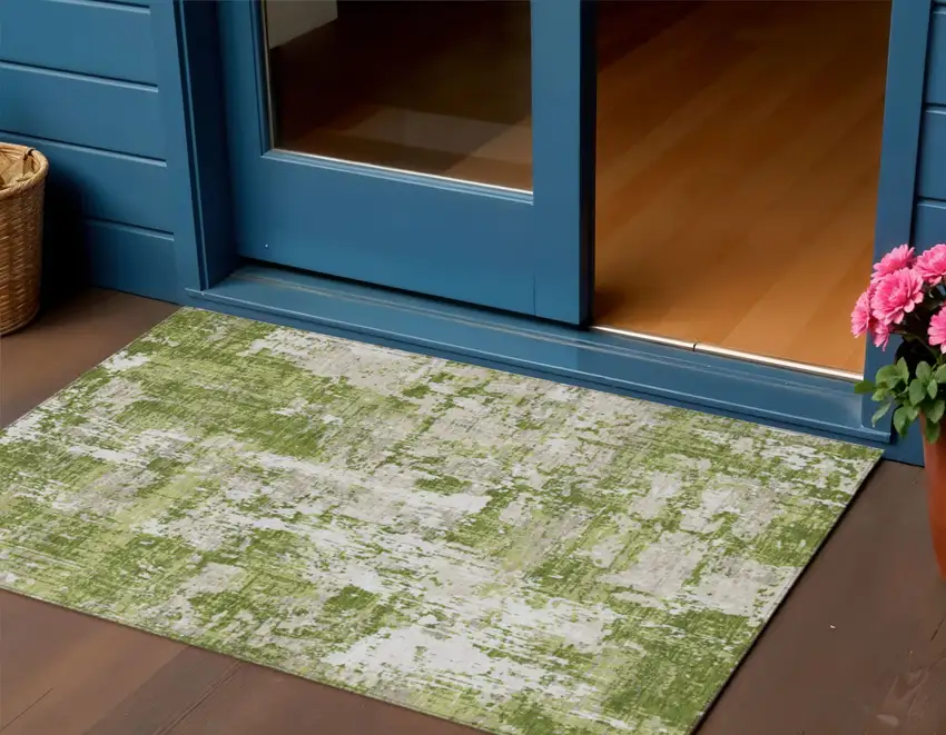 Green And Ivory Abstract Washable Indoor Outdoor Area Rug Photo 1
