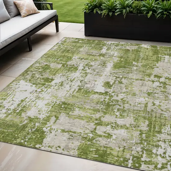 Green And Ivory Abstract Washable Indoor Outdoor Area Rug Photo 1