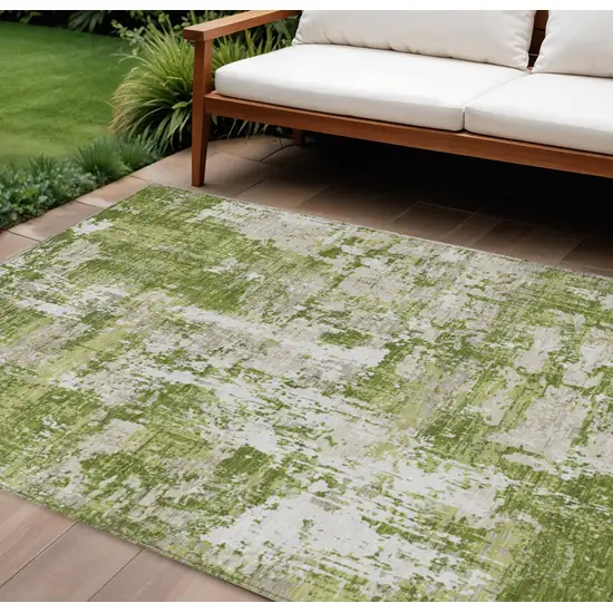 Green And Ivory Abstract Washable Indoor Outdoor Area Rug Photo 1