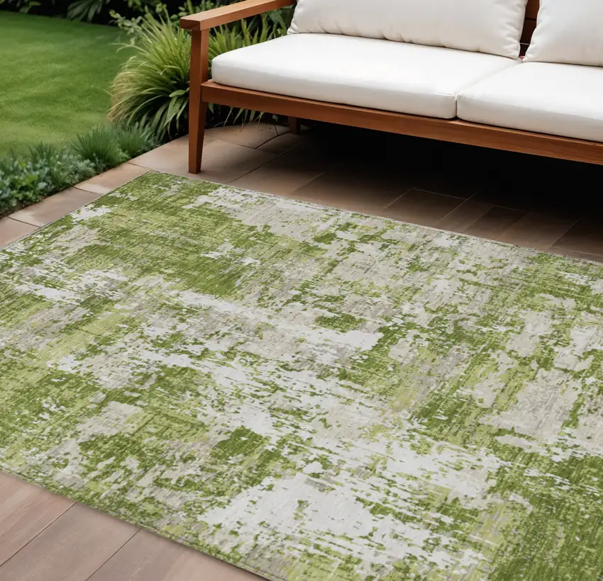 Green And Ivory Abstract Washable Indoor Outdoor Area Rug Photo 1