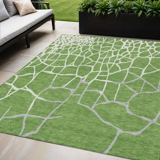 Green And Ivory Abstract Washable Indoor Outdoor Area Rug Photo 1
