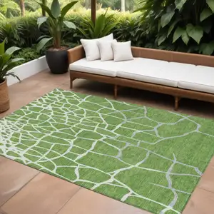 Photo of Green And Ivory Abstract Washable Indoor Outdoor Area Rug
