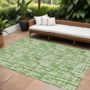 Photo of Green And Ivory Abstract Washable Indoor Outdoor Area Rug