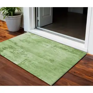 Photo of Green And Ivory Abstract Washable Indoor Outdoor Area Rug