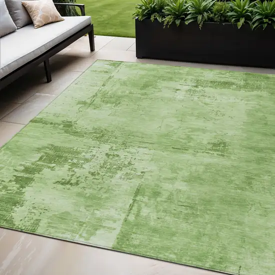Green And Ivory Abstract Washable Indoor Outdoor Area Rug Photo 1