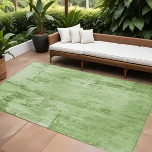 Photo of Green And Ivory Abstract Washable Indoor Outdoor Area Rug