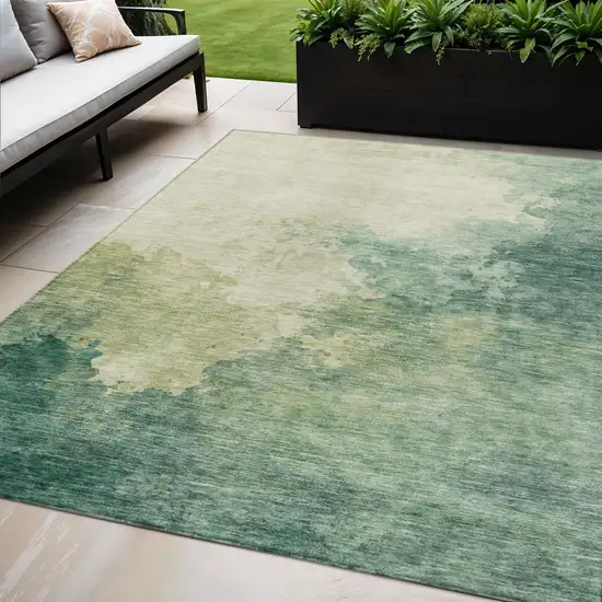 Green And Ivory Abstract Washable Indoor Outdoor Area Rug Photo 1