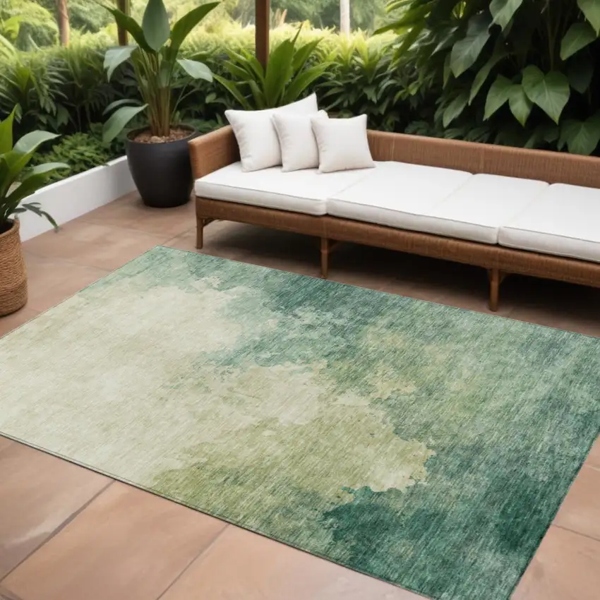 Green And Ivory Abstract Washable Indoor Outdoor Area Rug Photo 1