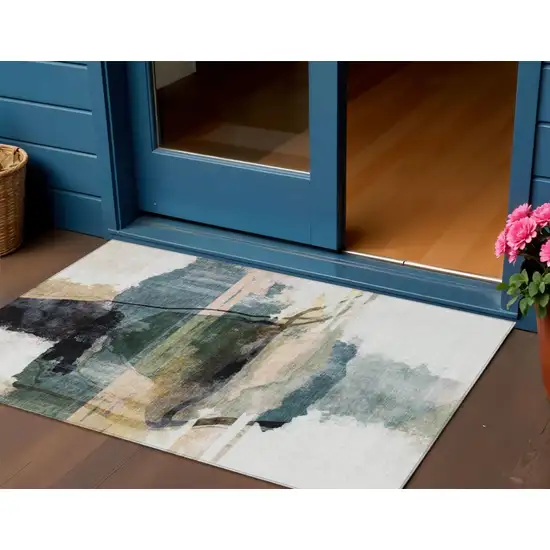 Green And Ivory Abstract Washable Indoor Outdoor Area Rug Photo 2