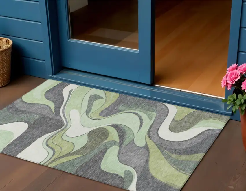 Green And Ivory Abstract Washable Indoor Outdoor Area Rug Photo 2