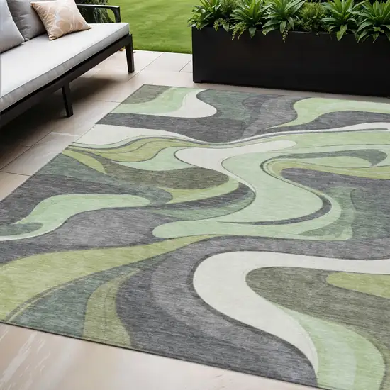 Green And Ivory Abstract Washable Indoor Outdoor Area Rug Photo 2