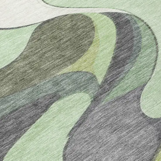 Green And Ivory Abstract Washable Indoor Outdoor Area Rug Photo 5