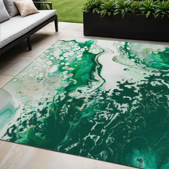 Green And Ivory Abstract Washable Indoor Outdoor Area Rug Photo 1