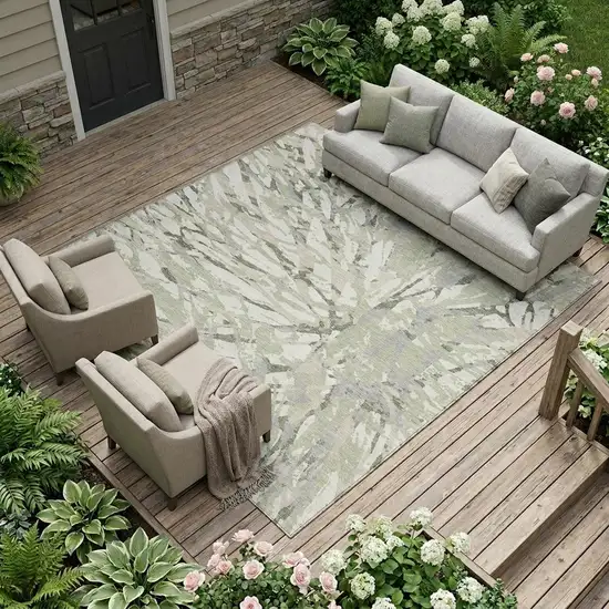 Green And Ivory Abstract Washable Indoor Outdoor Area Rug Photo 1
