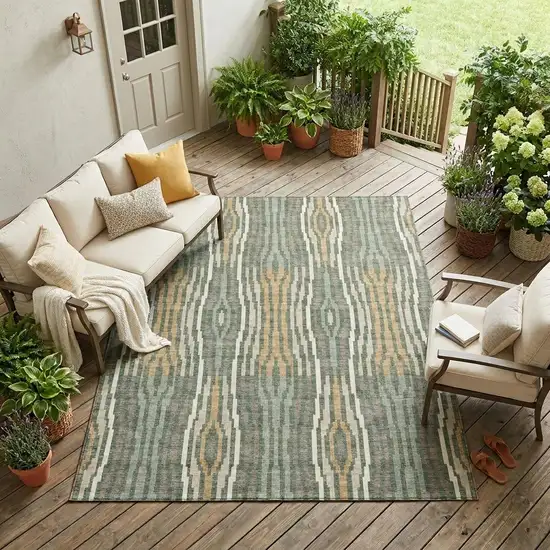 Green And Ivory Abstract Washable Indoor Outdoor Area Rug Photo 1
