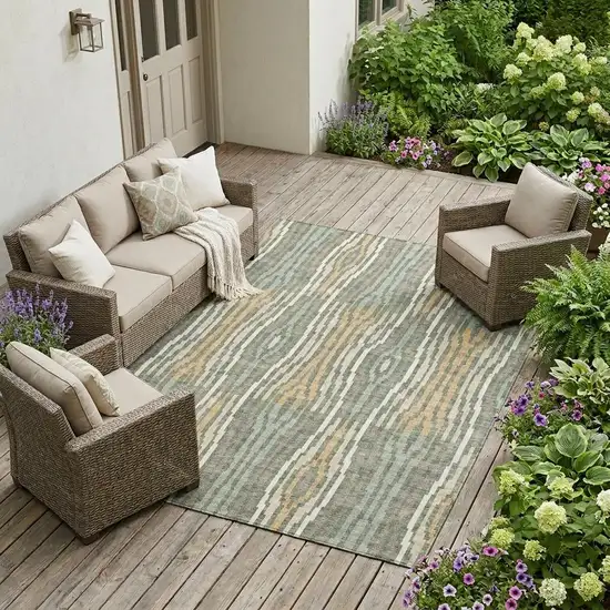 Green And Ivory Abstract Washable Indoor Outdoor Area Rug Photo 1