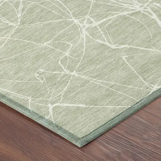 Green And Ivory Abstract Washable Indoor Outdoor Area Rug Photo 3