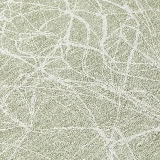 Green And Ivory Abstract Washable Indoor Outdoor Area Rug Photo 4