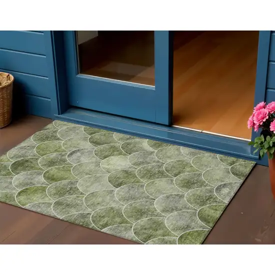 Green And Ivory Abstract Washable Indoor Outdoor Area Rug Photo 1