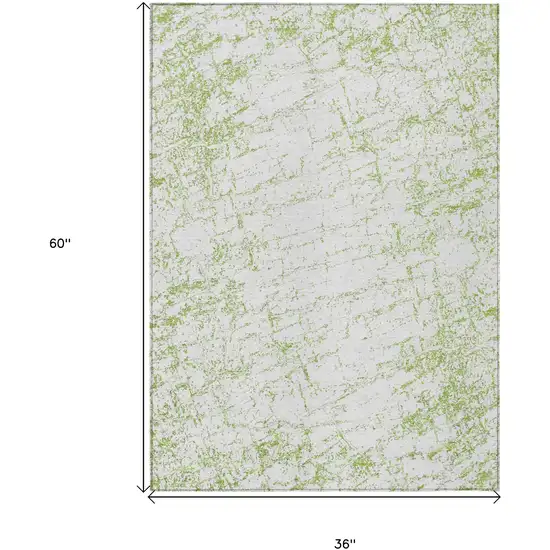 Green And Ivory Abstract Washable Indoor Outdoor Area Rug Photo 3