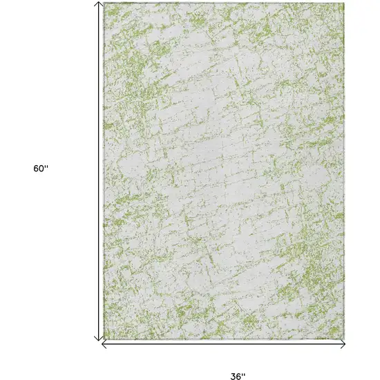 Green And Ivory Abstract Washable Indoor Outdoor Area Rug Photo 3