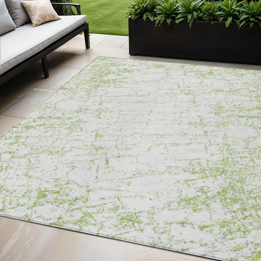 Green And Ivory Abstract Washable Indoor Outdoor Area Rug Photo 1