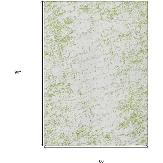 Green And Ivory Abstract Washable Indoor Outdoor Area Rug Photo 3