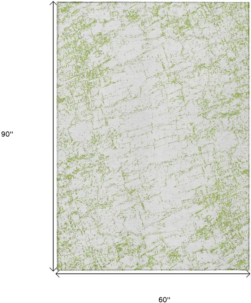 Green And Ivory Abstract Washable Indoor Outdoor Area Rug Photo 3