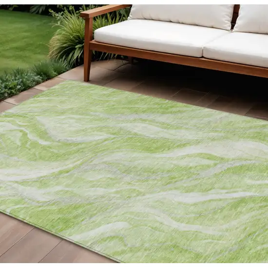 Green And Ivory Abstract Washable Indoor Outdoor Area Rug Photo 1