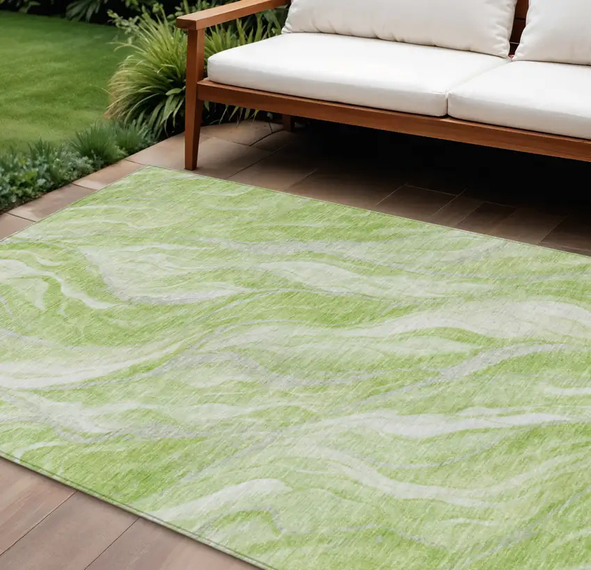 Green And Ivory Abstract Washable Indoor Outdoor Area Rug Photo 1