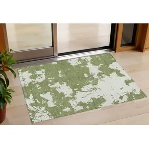 Photo of Green And Ivory Abstract Washable Indoor Outdoor Area Rug