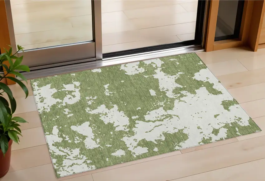 Green And Ivory Abstract Washable Indoor Outdoor Area Rug Photo 1
