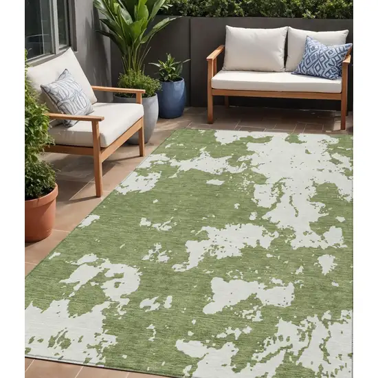 Green And Ivory Abstract Washable Indoor Outdoor Area Rug Photo 1