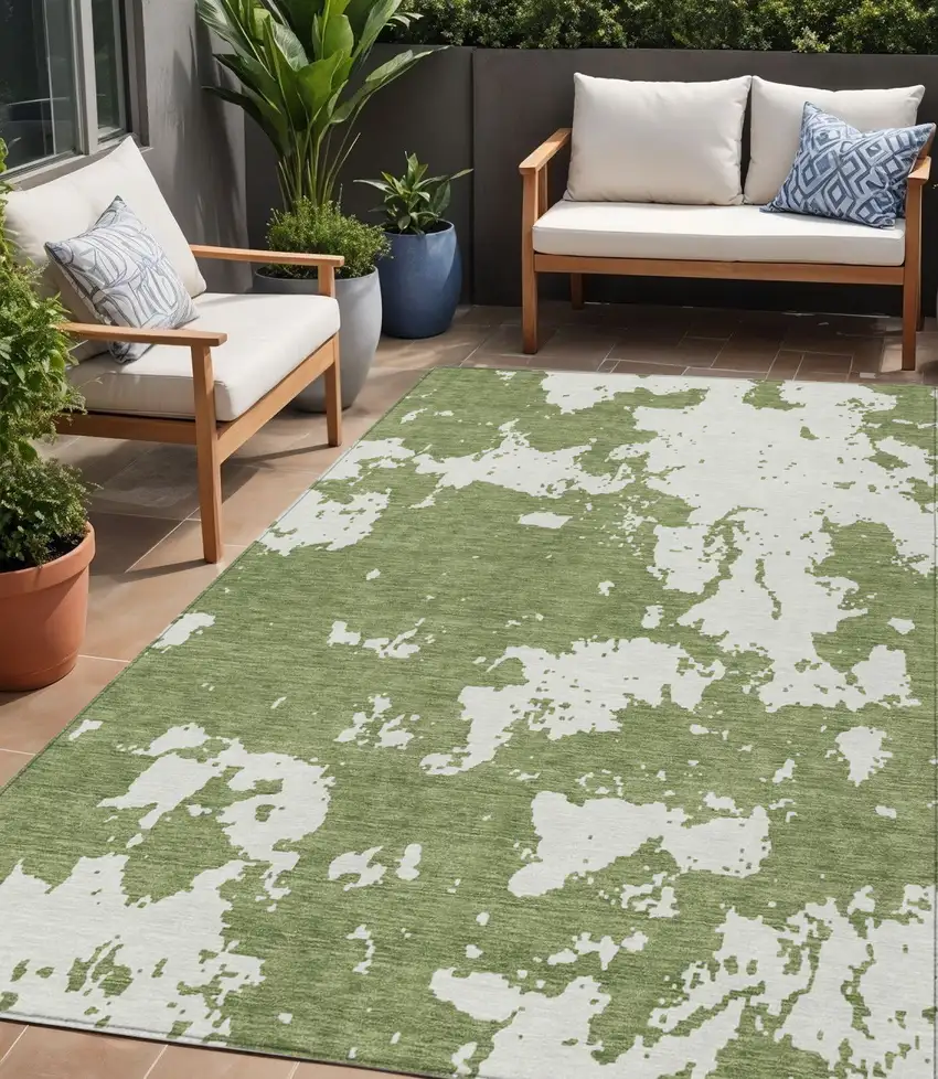 Green And Ivory Abstract Washable Indoor Outdoor Area Rug Photo 1