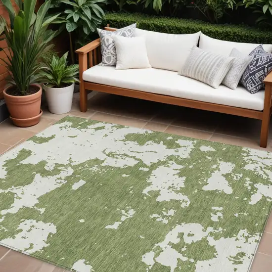 Green And Ivory Abstract Washable Indoor Outdoor Area Rug Photo 1
